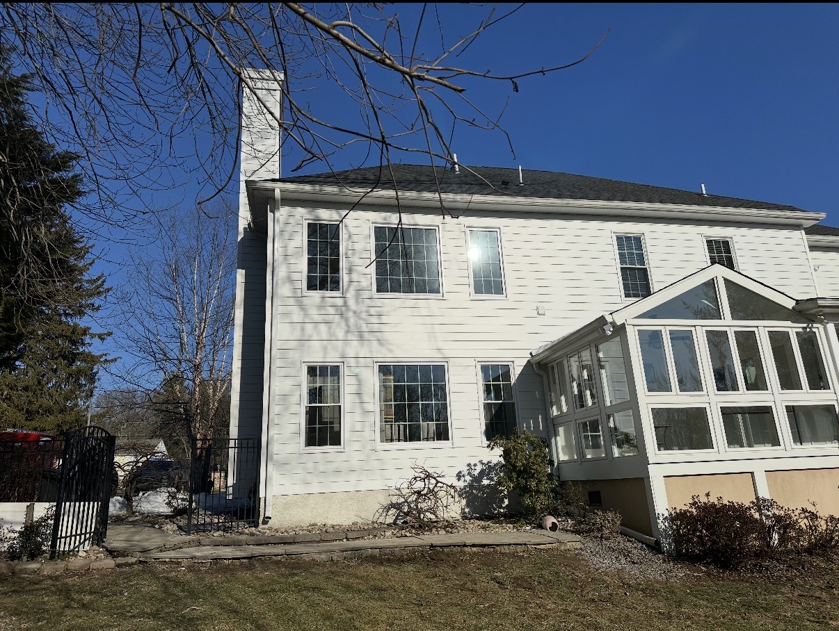 Stucco to Board-and-Batten Back — after