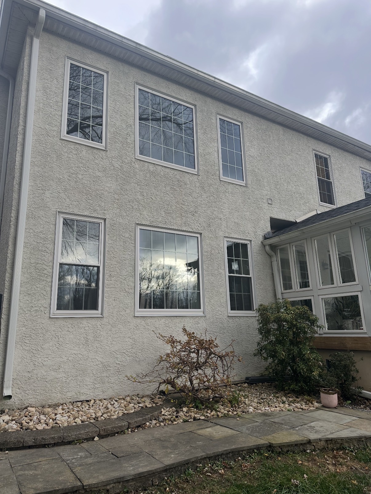 Stucco to Board-and-Batten Back — before