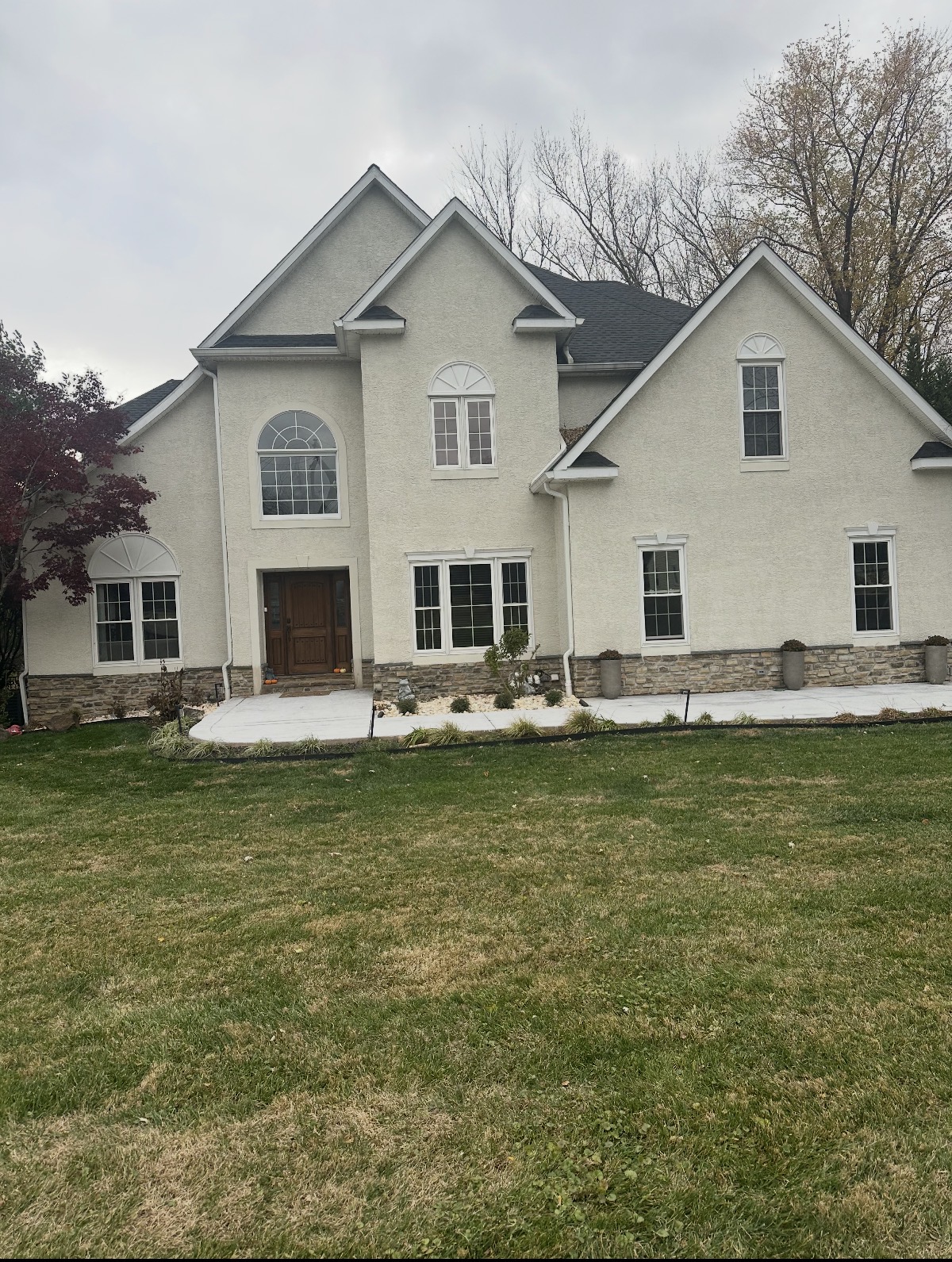 Stucco to Board-and-Batten Front — before