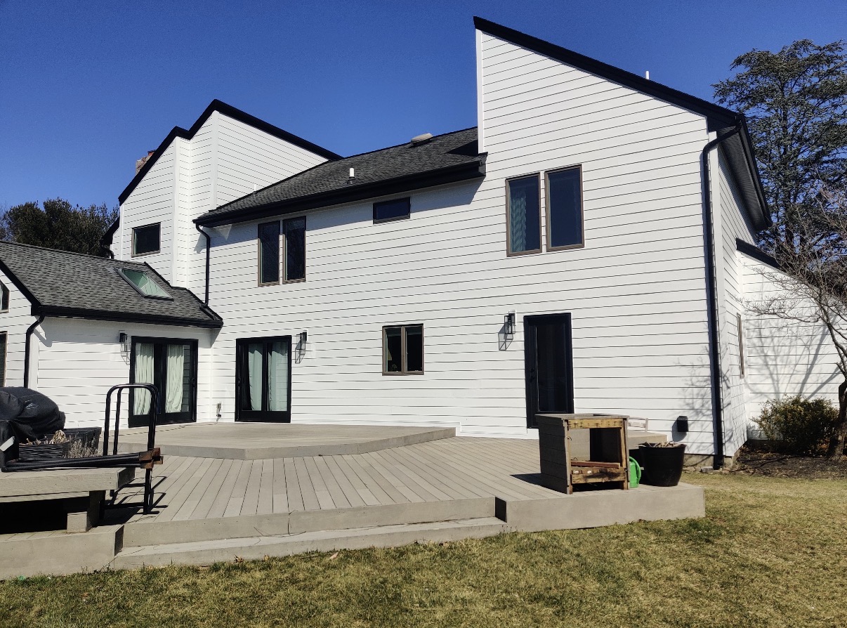 White Hardie siding on a modern rear elevation